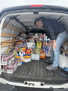 Loading up van with goods to hand out to victims of the flood