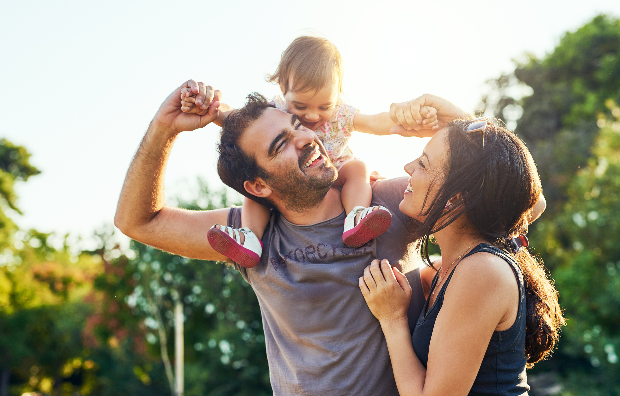 Shot of a young family outdoors